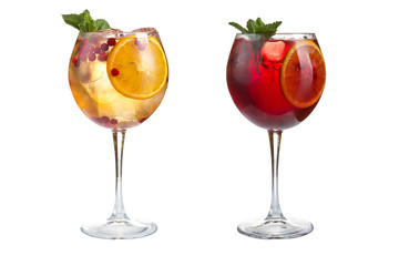 Two summer cocktails with mint, fruits and berries on a white background. Cocktails in glass goblets.