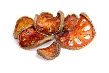 Image of dry bael fruit on white background. Food.