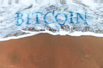 Fototapeta premium Concept of bitcoin on waves on the beach side . ups and downs in cryptocurrency . trending advertisement banner 