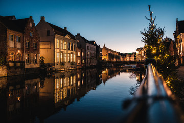 Obraz premium typical street near the river in Gent at blue hour, Belgium