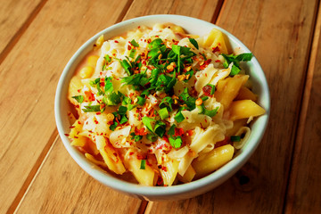 pasta with vegetables in wood table