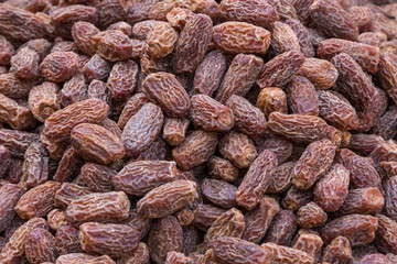 heap of date fruits on market