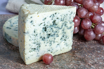 Fourme Ambert and Blue Auvergne semi-hard AOP French blue cheeses made from raw cow milk in Auvergne, France