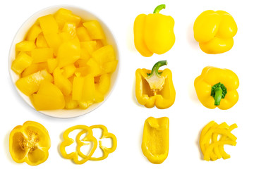 Set of fresh whole and sliced yellow bell pepper isolated on white background. Top view