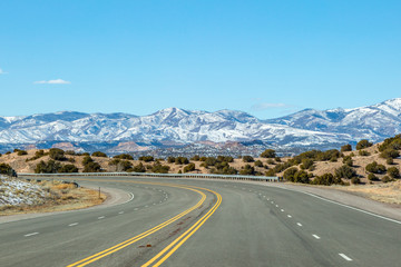 The view of snow capped mountains whilst on the road to Los Alamos, New Mexico