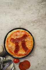 Pi day pepperoni Pizza overhead view