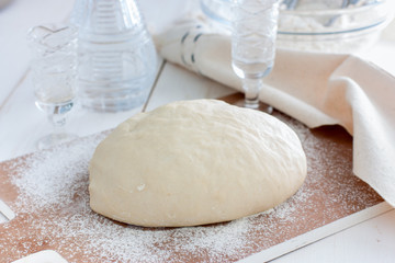 Raw unleavened dough made using vodka, selective focus