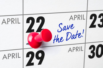 Wall calendar with a red pin - April 22