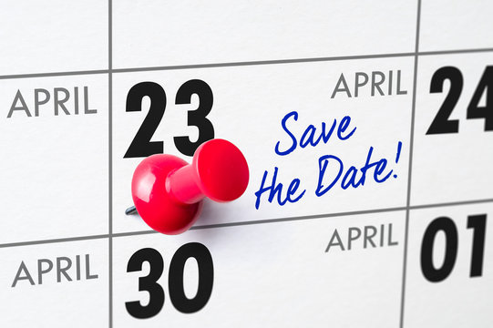 Wall calendar with a red pin - April 23