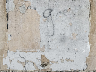 vieux mur en béton gris avec inscriptions