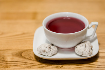 A white cup of fruit tea