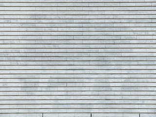 mur en briques rectangulaires grises