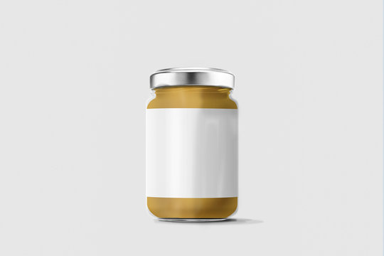 Glass jar of peanut butter with blank label over soft background. Mock up. 3D rendering.