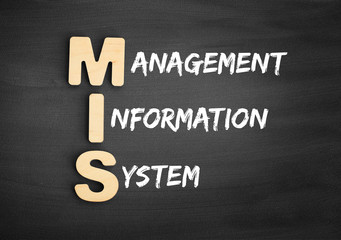 Wooden alphabets building the word MIS - Management Information System acronym on blackboard