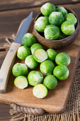 cabbage sprouts on wooden surface