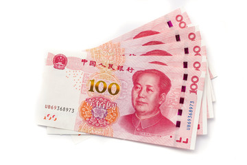 Hundred Chinese Yuan banknotes on white background, paper money, Bank of China, Financial system of...