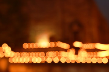 blurry candlelight procession on Buddhist day at Mahaeyong temple in Thailand