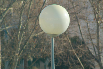 round and white street lamp 