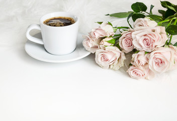 Wedding composition. A gentle picture for a story or a blog. Pink roses, coffee and fluffy rug. Beautiful morning.  Flat lay. Copy space.