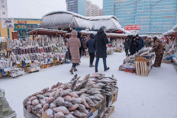 Yakutsk, Republic of Yakutia, Russia. 01.16.2019.The coldest market in the world is in the city of Yakutsk. It sells fresh-frozen fish, meat, berries. The temperature drops to -57 degrees.
