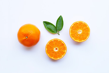 High vitamin C. Fresh orange citrus fruit with leaves isolated on white