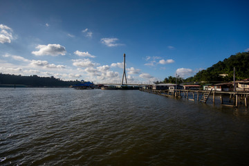 Fototapeta premium Raja Isteri Pengiran Anak Hajah Saleha bridge or Sungai Kebun bridge overlooking a water village in Brunei Darussalam