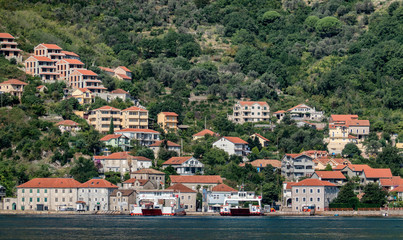 Fototapeta na wymiar Ferries in Kotor Bay, Montenegro