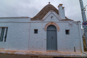 ALBEROBELLO, APULIA, ITALY - FEBRUARY 03 - Beautiful view of the traditional trulli houses with...