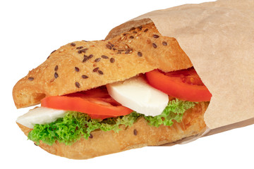 croissant sandwich with mozzarella and tomato isolated on white background
