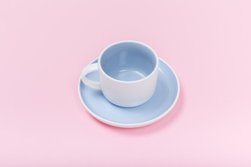 coffee or tea cup on pink background.