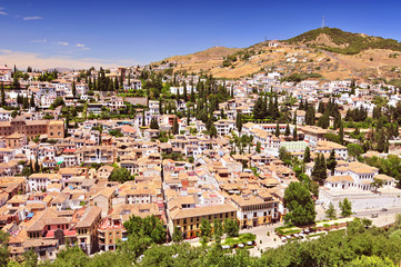 Fototapeta na wymiar A view of Granada and part the Albayzin (Albaicin) quarter, as seen from the Alcazaba citadel of the Alhambra, Spain.
