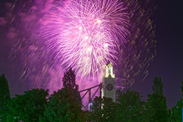 The Montreal International Fireworks Competition with the Montreal Harbour Bridge and Old Port Clock Tower