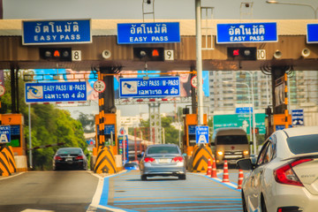 Extra blue easy pass lane to paying the easy pass tolls fee at the automated tollbooth that faster and easier than the normal cash payment lane.