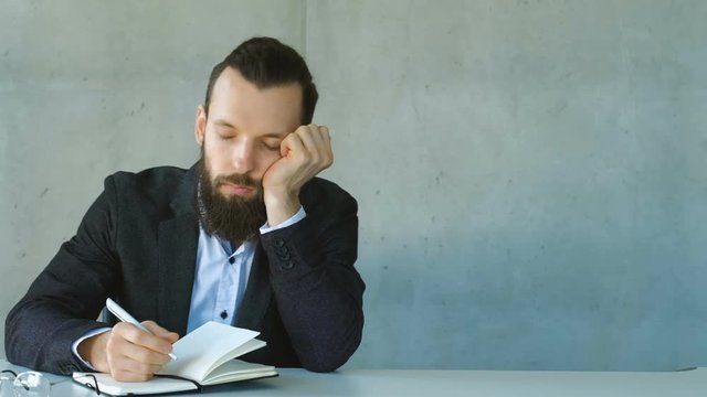 Bored at office meeting. Man doze off at workplace and falling down. Tired worker daydreaming