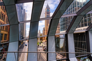 Old City Hall seen from inside the Helix Sky Bridge that links the Eaton Centre to the Hudson Bay...