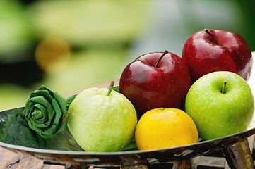 Thai exotic tropical fruits in luxury silver basket, welcome fruit basket in hotel
