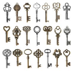 Set of vintage ornate keys on white background