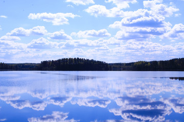 Reflection of the sky in the blue lake. Wonderful view