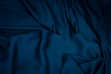 Smooth elegant blue silk. To be used as background.
