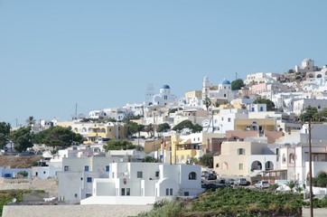 Fototapeta na wymiar Typical white Greek village build on a Mediterranean mountain 