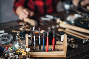 necessary tools of the technician are placed on table, blurred background, equipment for craftsman