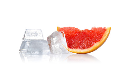 Slice of grapefruit and ice cubes on white background