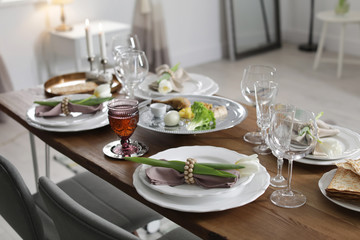 Festive Passover table setting at home. Pesach celebration