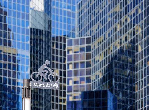 Sign for the Claire Morissette cycle path on Maisonneuve street in downtown Montreal, Quebec, Canada