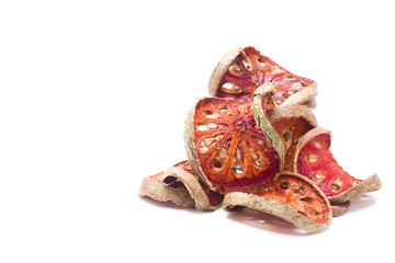 Dried slice bael fruit with hard skin on white background. Ready to boil bale fruit for drink good for health.