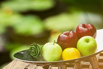 Thai exotic tropical fruits in luxury silver basket, welcome fruit basket in hotel