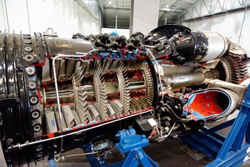 A cutaway model of a jet engine showing the turbine blades