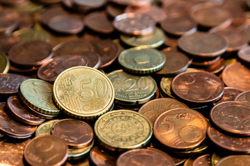 50 Cent - Many Euro coins and cents on a table