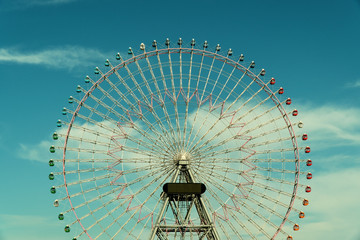 ferris wheel under the afternoon sky
