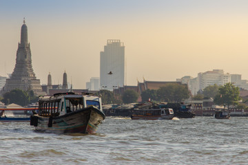 Waterway traffic in Chao Phraya River. The Chao Phraya Express Boat, a transportation service in...